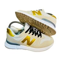 New Balance Silky Gold Sneakers